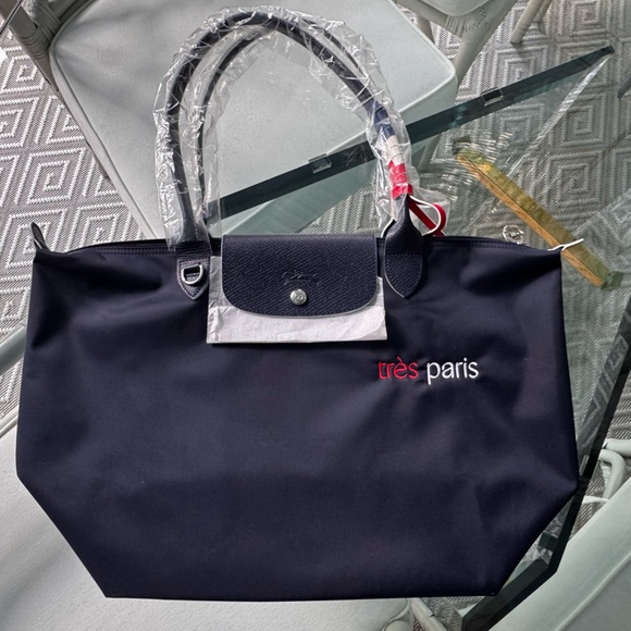 Longchamp Handbags - Longchamp Navy Tote with Red and White Logo
